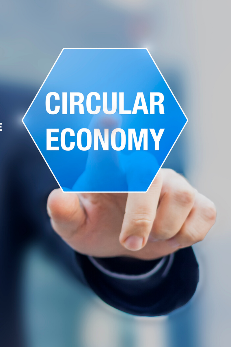 Man Pointing to Circular Economy Sign